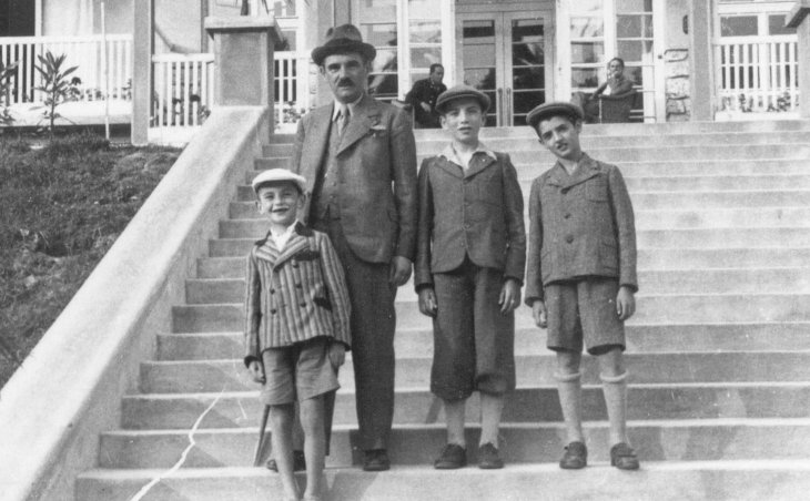 Aron Grunhut with sons Benny, left, and Leo, center. The son on right is unidentified.