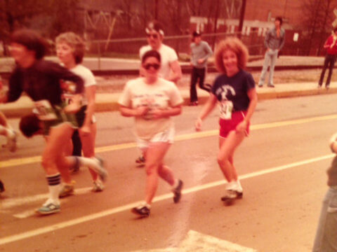 The author, center, in white shirt and sunglasses, running with her friend Beverly (in the red shorts to her right) in the ’70s.