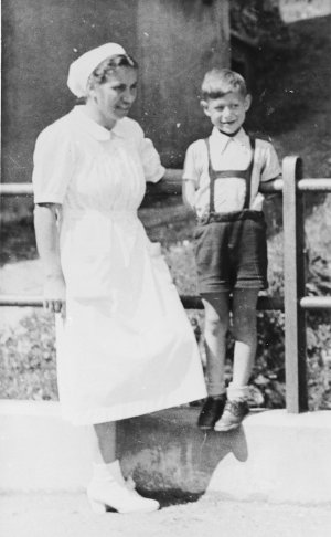 Joel Fabian with a nurse at a sanatorium in Davos, Switzerland, where he is recovering from tuberculosis he contracted in Theresienstadt.