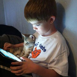 Conner and his best friend, Jelly, a special kitty his family adopted. (Photo courtesy of Cat Depot)