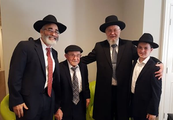 Rabbi Lau with Ben Hiller, his son, and grandson