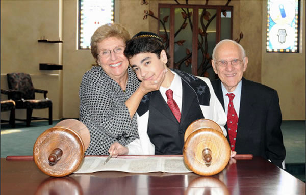 Rella and her husband celebrating their grandson’s bar mitzvah.